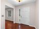Clean entrance featuring hardwood floors, neutral paint, and ample natural light at 440 Ohern Ct, Stone Mountain, GA 30088