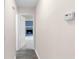 Hallway with a view of a cozy living area with a fireplace at 440 Ohern Ct, Stone Mountain, GA 30088