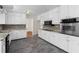 Beautiful eat-in kitchen features tiled floors and updated appliances at 440 Ohern Ct, Stone Mountain, GA 30088