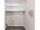 Utility room with connections for washer and dryer and built in shelves at 440 Ohern Ct, Stone Mountain, GA 30088