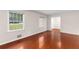 Cozy living room with hardwood floors and windows, with a bright and inviting space at 440 Ohern Ct, Stone Mountain, GA 30088