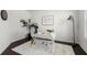 Bright and modern office featuring a large window, a desk, and contemporary decor at 485 St Annes Pl, Covington, GA 30016