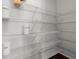 Walk-in pantry with metal shelving for organizing food and kitchen essentials at 485 St Annes Pl, Covington, GA 30016