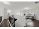 Upstairs living room with hardwood floors and modern gray furniture at 485 St Annes Pl, Covington, GA 30016