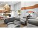 Stylish lounge area with comfortable seating, a fireplace, and ample natural light, creating a perfect space for relaxation at 860 Peachtree Ne St # 909, Atlanta, GA 30308