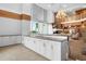 Amenity lounge with white cabinets, sink and seating area with view at 860 Peachtree Ne St # 909, Atlanta, GA 30308