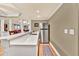 Basement bar area featuring a white countertop, stainless steel fridge, and wood-look flooring at 3125 Flatbottom Dr, Dacula, GA 30019