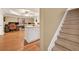 Basement featuring a staircase and an open layout with a desk and a kitchenette at 3125 Flatbottom Dr, Dacula, GA 30019