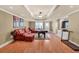 Finished basement featuring a pool table, leather sofa and outside access at 3125 Flatbottom Dr, Dacula, GA 30019