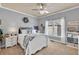 Cozy bedroom with carpeted floors, a ceiling fan, and a window providing natural light at 3125 Flatbottom Dr, Dacula, GA 30019