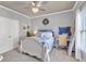 Charming bedroom featuring a comfortable bed, neutral walls, and a well-lit space with a peaceful ambiance at 3125 Flatbottom Dr, Dacula, GA 30019