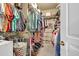 Walk-in closet with built-in shelving and hanging racks, providing ample storage at 3125 Flatbottom Dr, Dacula, GA 30019
