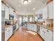 Spacious kitchen with stainless steel appliances and adjacent dining area at 3125 Flatbottom Dr, Dacula, GA 30019