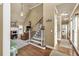 View of an entryway and a living room space featuring a fire place and connecting hallways at 3125 Flatbottom Dr, Dacula, GA 30019