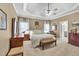 Spacious main bedroom features tray ceilings, neutral decor, and carpeted floors for a comfortable retreat at 3125 Flatbottom Dr, Dacula, GA 30019