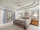 This spacious bedroom features french doors, neutral colors, and carpet floors at 4627 Angelo Ne Dr, Atlanta, GA 30319