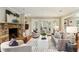 Bright living room features a stone fireplace and neutral decor at 4627 Angelo Ne Dr, Atlanta, GA 30319