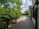 A wooden deck offers scenic views, blending seamlessly with the natural beauty of the surrounding landscape at 464 Pine Tree Ne Dr, Atlanta, GA 30305