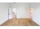 Bright bedroom with hardwood floors, white walls, and trim at 464 Pine Tree Ne Dr, Atlanta, GA 30305