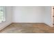 Bright bedroom with hardwood floors, white walls, and trim at 464 Pine Tree Ne Dr, Atlanta, GA 30305