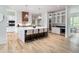 Modern kitchen features a large island, stainless appliances, and custom cabinetry at 464 Pine Tree Ne Dr, Atlanta, GA 30305