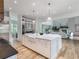 Spacious kitchen island with white marble countertop, stainless steel appliances, and open layout at 464 Pine Tree Ne Dr, Atlanta, GA 30305
