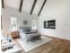 Spacious main bedroom with vaulted ceilings, exposed beams, and neutral decor at 464 Pine Tree Ne Dr, Atlanta, GA 30305