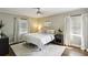 Cozy bedroom with neutral tones, soft lighting, and plush rug at 960 Lindridge Ne Dr, Atlanta, GA 30324