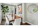 Bright dining room with large windows and a view of the backyard at 960 Lindridge Ne Dr, Atlanta, GA 30324
