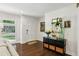 Tastefully decorated entryway with a console table, decorative items, and hardwood flooring at 960 Lindridge Ne Dr, Atlanta, GA 30324