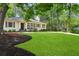 Charming home with a well manicured lawn, mature trees and inviting curb appeal at 960 Lindridge Ne Dr, Atlanta, GA 30324