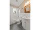 Bathroom with classic black and white checkered floor and shower-tub combination at 97 Peachtree Hills Ne Ave, Atlanta, GA 30305