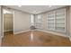 Bonus room with ample storage, large window, and cork floors at 97 Peachtree Hills Ne Ave, Atlanta, GA 30305