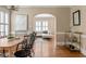Dining room with hardwood floors and adjacent to living room with an open layout at 97 Peachtree Hills Ne Ave, Atlanta, GA 30305