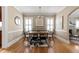 Inviting dining room featuring hardwood floors, modern lighting, and an open floor plan at 97 Peachtree Hills Ne Ave, Atlanta, GA 30305