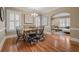 Elegant dining room with hardwood floors, stylish lighting, and an open layout at 97 Peachtree Hills Ne Ave, Atlanta, GA 30305