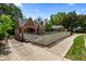 Charming brick home with a white picket fence and well-manicured landscaping at 97 Peachtree Hills Ne Ave, Atlanta, GA 30305