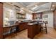 Well-appointed kitchen with breakfast nook, stainless steel appliances, and custom cabinets at 97 Peachtree Hills Ne Ave, Atlanta, GA 30305