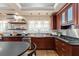 Beautiful cherry kitchen with stainless steel appliances, and lots of light at 97 Peachtree Hills Ne Ave, Atlanta, GA 30305