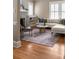 Hardwood floors in a cozy living room, neutral decor, and bright windows at 97 Peachtree Hills Ne Ave, Atlanta, GA 30305