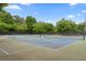Outdoor tennis courts with green surroundings at 97 Peachtree Hills Ne Ave, Atlanta, GA 30305