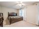 Bedroom includes neutral carpet, ceiling fan and natural light at 3746 Berkeley Xing, Duluth, GA 30096