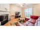 Bright and airy living room with hardwood floors, a fireplace, and comfortable seating at 3746 Berkeley Xing, Duluth, GA 30096