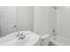 Clean bathroom features a white tile shower-tub combo, toilet, and vanity at 6080 Indian Wood Se Cir, Mableton, GA 30126