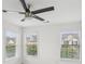 Bright bedroom featuring a ceiling fan and natural light from the windows at 6080 Indian Wood Se Cir, Mableton, GA 30126