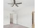 Bedroom offering plush carpeting, a ceiling fan, and an ensuite bathroom at 6080 Indian Wood Se Cir, Mableton, GA 30126