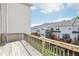 Wooden deck providing an outdoor seating area with a view of neighboring homes at 6080 Indian Wood Se Cir, Mableton, GA 30126