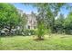 Spacious backyard with greenery and outdoor seating area at 70 Old Ivy Ne Rd # 29, Atlanta, GA 30342