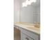 Bathroom featuring gold hardware, a light marble countertop and bright lighting at 70 Old Ivy Ne Rd # 29, Atlanta, GA 30342