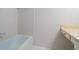 A bathroom showcasing white tiled walls, a shower and tub combo, and a neutral color palette at 70 Old Ivy Ne Rd # 29, Atlanta, GA 30342